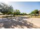 Expansive front yard showcasing a basketball court and well-manicured landscaping at 2107 E Park Ave, Gilbert, AZ 85234