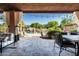 Inviting outdoor living space featuring comfortable seating and a view of the pool at 2107 E Park Ave, Gilbert, AZ 85234