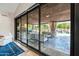 Outdoor patio featuring a seating area, fireplace, and pool with a waterfall at 2107 E Park Ave, Gilbert, AZ 85234