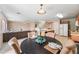 The dining room has seating for four and is situated between the kitchen and living room at 2327 E Meadow Creek Way, San Tan Valley, AZ 85140