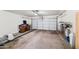 Spacious garage with ample storage and room for parking vehicles at 2327 E Meadow Creek Way, San Tan Valley, AZ 85140