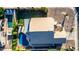 Aerial view showcases backyard pool and covered patio, landscaping, and unique backyard design at 2343 E Morelos St, Chandler, AZ 85225