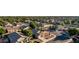 Aerial view of a desert neighborhood with many well maintained homes, desert landscaping and mature trees at 2343 E Morelos St, Chandler, AZ 85225
