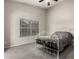 Serene bedroom with neutral carpeting, a large window, and plenty of natural light at 2343 E Morelos St, Chandler, AZ 85225
