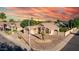 Beautiful single-story home featuring desert landscaping, a two-car garage, and a charming neutral color palette at 2343 E Morelos St, Chandler, AZ 85225