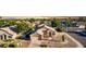 Aerial front exterior showcasing charming curb appeal, low maintenance landscaping, and inviting front entry at 2343 E Morelos St, Chandler, AZ 85225