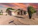 Charming single-story home with desert landscaping and a two-car garage at 2343 E Morelos St, Chandler, AZ 85225