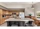 Well-equipped kitchen with granite countertops, stainless steel appliances, and a copper sink at 2343 E Morelos St, Chandler, AZ 85225