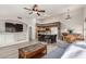 Open-concept living area flows into a modern kitchen, featuring an island with seating at 2343 E Morelos St, Chandler, AZ 85225