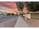 Tree lined street in a residential area with lush landscaping, sidewalks, block walls and decorative rock at 2343 E Morelos St, Chandler, AZ 85225