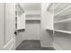 Walk-in closet featuring lots of shelving at 2343 E Morelos St, Chandler, AZ 85225