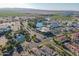 Aerial view showcasing the community's commercial area, ponds, and well-planned layout at 2421 W Indigo Dr, Chandler, AZ 85248