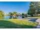Beautiful community lake view with lush lawns and tranquil waters, ideal for leisurely strolls at 2421 W Indigo Dr, Chandler, AZ 85248
