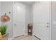 Bright entryway featuring neutral walls, with decor and convenient storage at 2499 S Entwistle St, Gilbert, AZ 85295