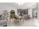 Open kitchen with island seating, stainless steel appliances and modern cabinetry at 2499 S Entwistle St, Gilbert, AZ 85295