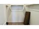 Walk-in closet featuring shelving and storage space for organization at 25137 W Wayland Dr, Buckeye, AZ 85326