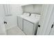 Laundry room featuring a white washer and dryer at 25137 W Wayland Dr, Buckeye, AZ 85326