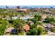 Picturesque neighborhood showcasing a mix of residential homes with lush landscaping and mature trees at 28 E 14Th St, Tempe, AZ 85281