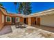 Inviting back patio features a table and chairs, perfect for outdoor relaxation and dining at 28 E 14Th St, Tempe, AZ 85281
