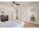 Cozy bedroom features a ceiling fan, carpet flooring, and neutral paint at 28 E 14Th St, Tempe, AZ 85281