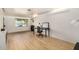 Bright office space with desk, chair, and wood flooring at 28 E 14Th St, Tempe, AZ 85281