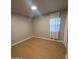 Bright bedroom with one window and beautiful laminate floors at 3526 E Piccadilly Rd, Phoenix, AZ 85018