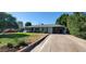 Charming single-story home with a well-maintained front yard, carport, and classic curb appeal at 3526 E Piccadilly Rd, Phoenix, AZ 85018