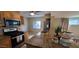 Modern kitchen with stainless steel appliances and a granite countertop at 3526 E Piccadilly Rd, Phoenix, AZ 85018