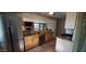 Updated kitchen with stainless steel appliances and ample counter space at 3526 E Piccadilly Rd, Phoenix, AZ 85018