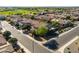 A beautiful home with a pool is nestled in an upscale community with mature trees at 3664 E Narrowleaf Dr, Gilbert, AZ 85298