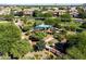 Aerial view of community park with bridges, play structures and shade trees at 3664 E Narrowleaf Dr, Gilbert, AZ 85298