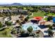 Aerial view of community park with basketball court, playground, and splash pad at 3664 E Narrowleaf Dr, Gilbert, AZ 85298