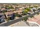 A beautifully landscaped home is nestled in an upscale community with mature trees at 3664 E Narrowleaf Dr, Gilbert, AZ 85298