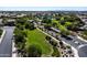 Aerial view of community park with grassy field and walking path at 3664 E Narrowleaf Dr, Gilbert, AZ 85298