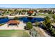 Aerial view of community lake and picnic areas and play structures at 3664 E Narrowleaf Dr, Gilbert, AZ 85298
