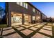 A backyard showcases a patio with pavers, grass and a barbecue area at 3664 E Narrowleaf Dr, Gilbert, AZ 85298