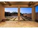 Expansive outdoor space with a covered patio area, pool, and manicured lawn at 3664 E Narrowleaf Dr, Gilbert, AZ 85298