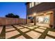 A backyard features a patio with pavers, grass and a privacy wall at 3664 E Narrowleaf Dr, Gilbert, AZ 85298