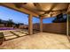 Spacious backyard patio with an outdoor pool, comfortable seating, and manicured landscape at 3664 E Narrowleaf Dr, Gilbert, AZ 85298