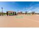 Community basketball court and picnic ramada offers residents recreational options at 3664 E Narrowleaf Dr, Gilbert, AZ 85298