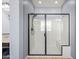 Bright bathroom showing the walk-in shower, finished with a black trim and a built-in bench at 3664 E Narrowleaf Dr, Gilbert, AZ 85298