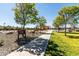 Bridges Park entrance with walking path, playground, and shaded picnic area at 3664 E Narrowleaf Dr, Gilbert, AZ 85298
