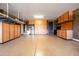 This spacious three car garage is spotless and features lots of storage at 3664 E Narrowleaf Dr, Gilbert, AZ 85298