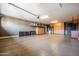 This spacious three car garage is spotless and features lots of storage at 3664 E Narrowleaf Dr, Gilbert, AZ 85298