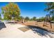 Well-maintained community playground with swings and slides, surrounded by a walking path and desert landscaping at 3664 E Narrowleaf Dr, Gilbert, AZ 85298