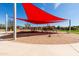 Community playground with modern climbing structures and shade, offering a fun and active space at 3664 E Narrowleaf Dr, Gilbert, AZ 85298