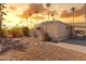 Home exterior featuring low-maintenance gravel landscaping and a shaded carport, perfect for outdoor living at 4065 E University Dr # 332, Mesa, AZ 85205