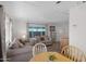 Open concept floorplan with dining table with kitchen and living room at 4065 E University Dr # 332, Mesa, AZ 85205