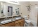 Bathroom with double sinks, granite countertops, and a shower-tub combination at 4117 E Molly Ln, Cave Creek, AZ 85331