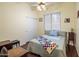 Comfortable bedroom featuring hardwood floors, and a quilt on the bed at 4117 E Molly Ln, Cave Creek, AZ 85331